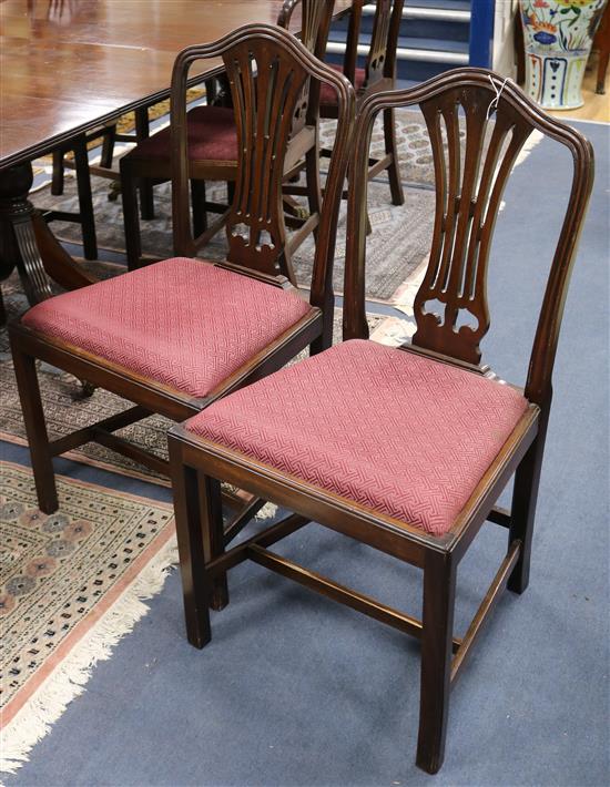 A set of eight George III style mahogany dining chairs